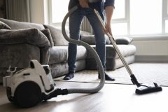 man-servant-doing-chores-around-house-scaled
