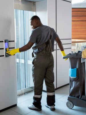 full-shot-man-pushing-elevator-button