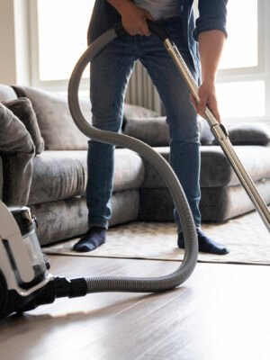 man-servant-doing-chores-around-house